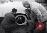 Standbild Firestone Nachweis REIFENPANNE REIFEN United States USA, 1955, aus Sekunde 19 historischem Filmmaterial Videoclip 65675037736