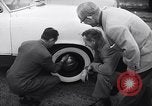Standbild Firestone Nachweis REIFENPANNE REIFEN United States USA, 1955, aus Sekunde 20 historischem Filmmaterial Videoclip 65675037736