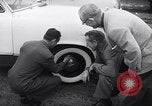 Standbild Firestone Nachweis REIFENPANNE REIFEN United States USA, 1955, aus Sekunde 21 historischem Filmmaterial Videoclip 65675037736