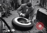 Standbild Firestone Nachweis REIFENPANNE REIFEN United States USA, 1955, aus Sekunde 33 historischem Filmmaterial Videoclip 65675037736