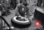 Standbild Firestone Nachweis REIFENPANNE REIFEN United States USA, 1955, aus Sekunde 35 historischem Filmmaterial Videoclip 65675037736