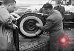 Standbild Firestone Nachweis REIFENPANNE REIFEN United States USA, 1955, aus Sekunde 47 historischem Filmmaterial Videoclip 65675037736