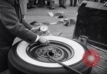 Standbild Firestone Nachweis REIFENPANNE REIFEN United States USA, 1955, aus Sekunde 51 historischem Filmmaterial Videoclip 65675037736