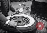 Standbild Firestone Nachweis REIFENPANNE REIFEN United States USA, 1955, aus Sekunde 54 historischem Filmmaterial Videoclip 65675037736