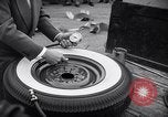 Standbild Firestone Nachweis REIFENPANNE REIFEN United States USA, 1955, aus Sekunde 55 historischem Filmmaterial Videoclip 65675037736