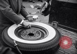 Standbild Firestone Nachweis REIFENPANNE REIFEN United States USA, 1955, aus Sekunde 56 historischem Filmmaterial Videoclip 65675037736