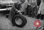 Standbild Firestone Nachweis REIFENPANNE REIFEN United States USA, 1955, aus Sekunde 61 historischem Filmmaterial Videoclip 65675037736