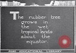 Image of rubber extraction South America, 1921, second 7 stock footage video 65675037752