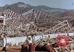 Image of wrecked steel frame Nagasaki Japan, 1946, second 10 stock footage video 65675037802