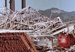 Image of wrecked steel frame Nagasaki Japan, 1946, second 4 stock footage video 65675037803