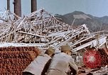 Image of wrecked steel frame Nagasaki Japan, 1946, second 10 stock footage video 65675037803
