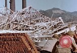 Image of wrecked steel frame Nagasaki Japan, 1946, second 11 stock footage video 65675037803