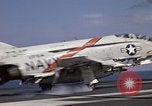 Image of Kitty Hawk flight deck operations Pacific Ocean, 1971, second 10 stock footage video 65675037823