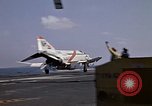 Image of Kitty Hawk flight deck operations Pacific Ocean, 1971, second 11 stock footage video 65675037823