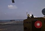 Image of Kitty Hawk flight deck operations Pacific Ocean, 1971, second 12 stock footage video 65675037823