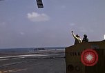 Image of Kitty Hawk flight deck operations Pacific Ocean, 1971, second 14 stock footage video 65675037823
