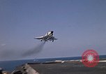 Image of Kitty Hawk flight deck operations Pacific Ocean, 1971, second 16 stock footage video 65675037823