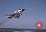 Image of Kitty Hawk flight deck operations Pacific Ocean, 1971, second 17 stock footage video 65675037823