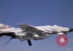 Image of Kitty Hawk flight deck operations Pacific Ocean, 1971, second 18 stock footage video 65675037823
