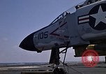 Image of Kitty Hawk flight deck operations Pacific Ocean, 1971, second 23 stock footage video 65675037823