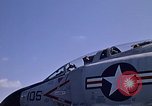 Image of Kitty Hawk flight deck operations Pacific Ocean, 1971, second 33 stock footage video 65675037823