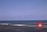 Image of Kitty Hawk flight deck operations Pacific Ocean, 1971, second 36 stock footage video 65675037823