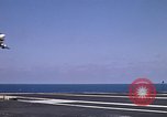 Image of Kitty Hawk flight deck operations Pacific Ocean, 1971, second 38 stock footage video 65675037823