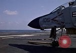 Image of Kitty Hawk flight deck operations Pacific Ocean, 1971, second 42 stock footage video 65675037823