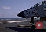Image of Kitty Hawk flight deck operations Pacific Ocean, 1971, second 43 stock footage video 65675037823