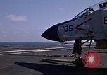 Image of Kitty Hawk flight deck operations Pacific Ocean, 1971, second 44 stock footage video 65675037823