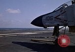 Image of Kitty Hawk flight deck operations Pacific Ocean, 1971, second 45 stock footage video 65675037823
