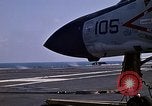 Image of Kitty Hawk flight deck operations Pacific Ocean, 1971, second 52 stock footage video 65675037823