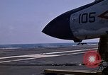 Image of Kitty Hawk flight deck operations Pacific Ocean, 1971, second 53 stock footage video 65675037823