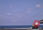 Image of Kitty Hawk flight deck operations Pacific Ocean, 1971, second 55 stock footage video 65675037823
