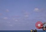 Image of Kitty Hawk flight deck operations Pacific Ocean, 1971, second 56 stock footage video 65675037823
