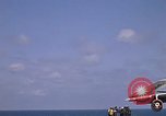 Image of Kitty Hawk flight deck operations Pacific Ocean, 1971, second 57 stock footage video 65675037823