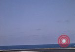 Image of Kitty Hawk flight deck operations Pacific Ocean, 1971, second 58 stock footage video 65675037823