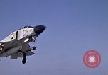 Image of Kitty Hawk flight deck operations Pacific Ocean, 1971, second 62 stock footage video 65675037823