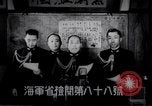 Image of Japanese admirals appeal by radio to defense workers Japan, 1944, second 3 stock footage video 65675037851