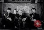 Image of Japanese admirals appeal by radio to defense workers Japan, 1944, second 5 stock footage video 65675037851