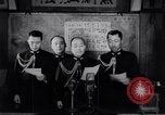 Image of Japanese admirals appeal by radio to defense workers Japan, 1944, second 7 stock footage video 65675037851