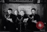 Image of Japanese admirals appeal by radio to defense workers Japan, 1944, second 8 stock footage video 65675037851