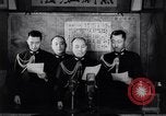 Image of Japanese admirals appeal by radio to defense workers Japan, 1944, second 9 stock footage video 65675037851