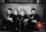 Image of Japanese admirals appeal by radio to defense workers Japan, 1944, second 14 stock footage video 65675037851