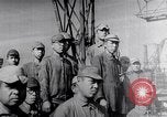 Image of Japanese admirals appeal by radio to defense workers Japan, 1944, second 50 stock footage video 65675037851