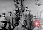 Image of Japanese admirals appeal by radio to defense workers Japan, 1944, second 51 stock footage video 65675037851