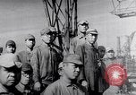 Image of Japanese admirals appeal by radio to defense workers Japan, 1944, second 53 stock footage video 65675037851