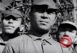 Image of Japanese admirals appeal by radio to defense workers Japan, 1944, second 54 stock footage video 65675037851