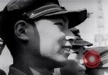 Image of Japanese admirals appeal by radio to defense workers Japan, 1944, second 60 stock footage video 65675037851