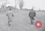 Standbild Mann und Frau mit zwei Hunden United States USA, 1948, aus Sekunde 5 historischem Filmmaterial Videoclip 65675037951